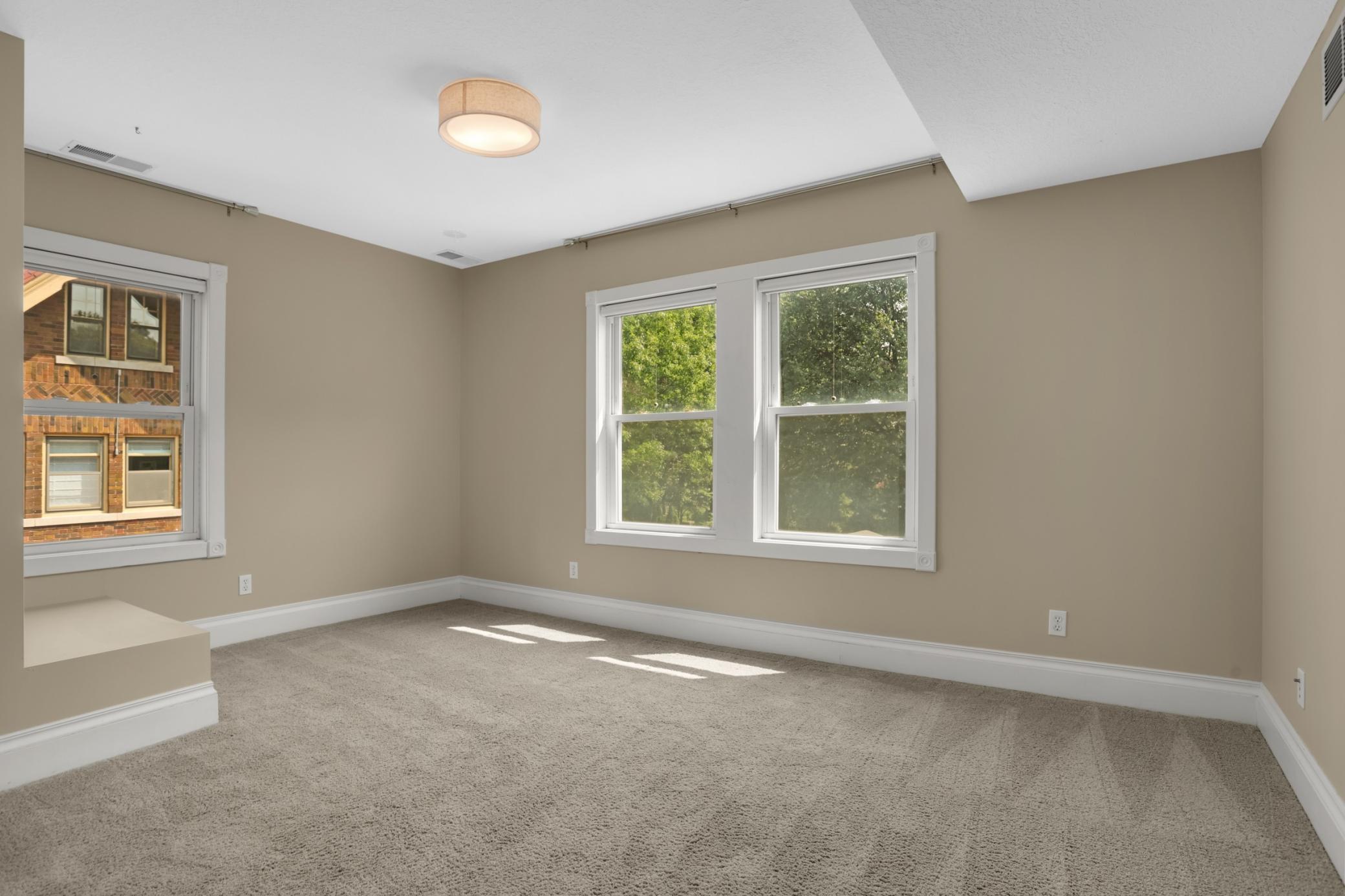 You'll be so impressed by the size of these bedrooms - a truly unique find in a vintage St Paul home!