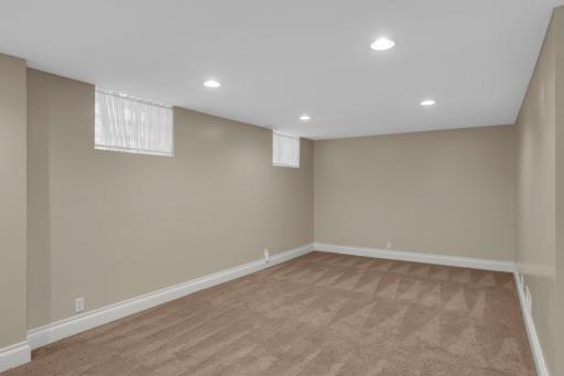Basement family room rounds out the interior of the home, offering another flexible living space.