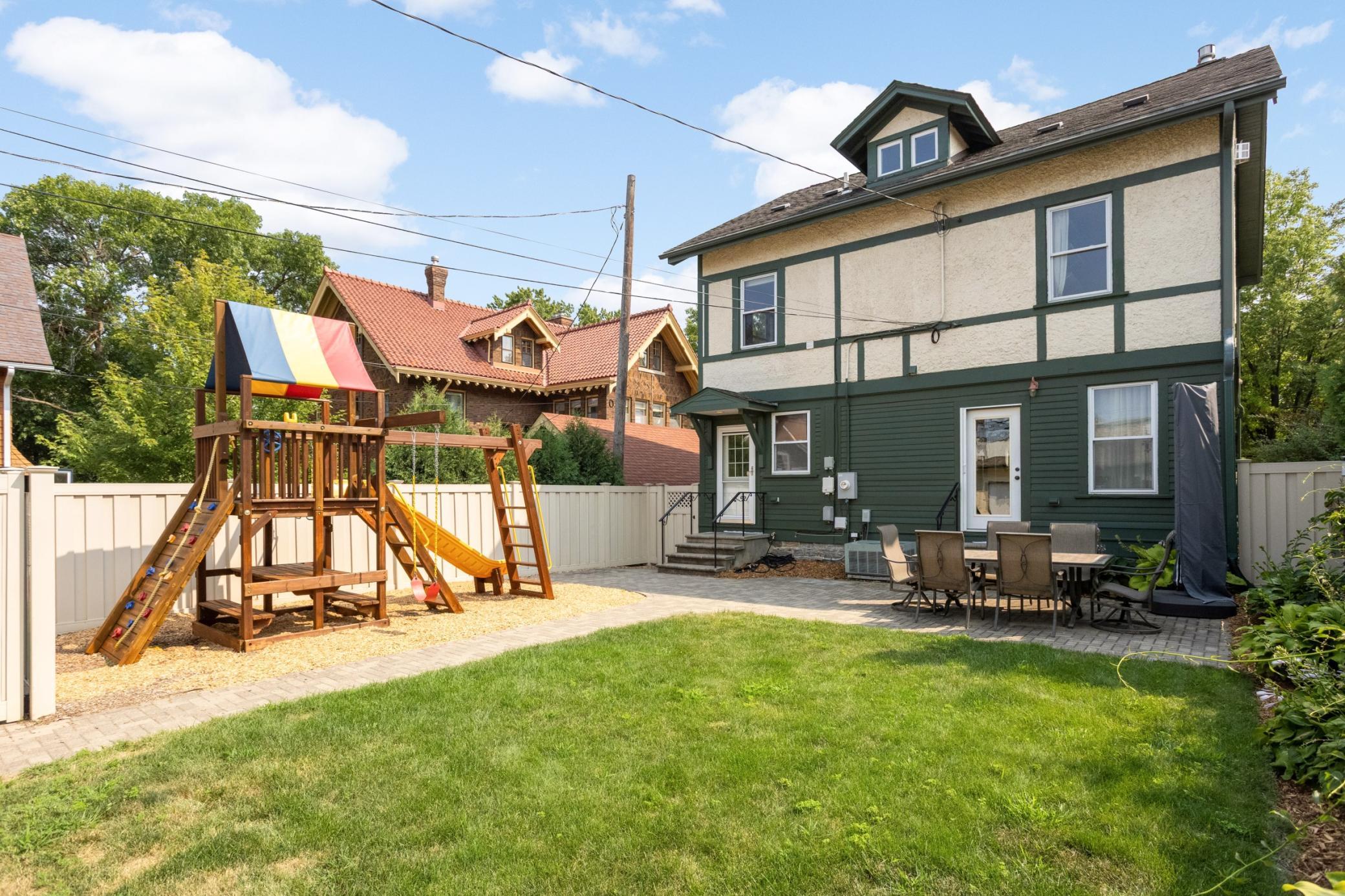 With full privacy fence, green space, and areas to garden, this backyard is the perfect place to unwind or entertain