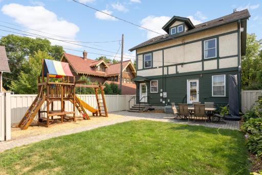 With full privacy fence, green space, and areas to garden, this backyard is the perfect place to unwind or entertain