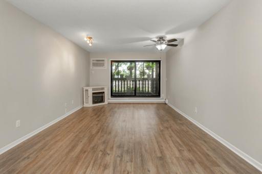 Living Room Walks out To fully Screened 3 season porch, A/C unit 4 Years new, Electric Fireplace