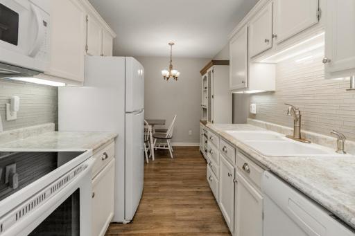 Kitchen Dining room and High Rise Faucet and Deep Two sided sink are great for doing dishes