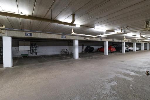 Garage stall includes locking storage cabinet, Electric outlet, Motion sensing lights and Bike rack