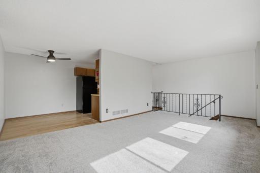 Living room, dining room and kitchen views.