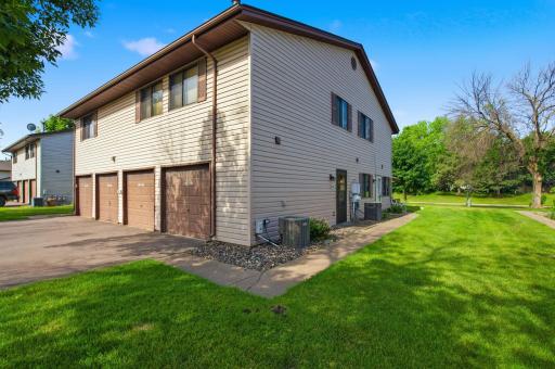Side door entrance. Unit is up the stairs for your one level living.