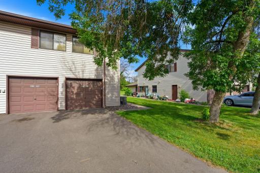 Nice longer driveway for chilling outdoors & room to grill!