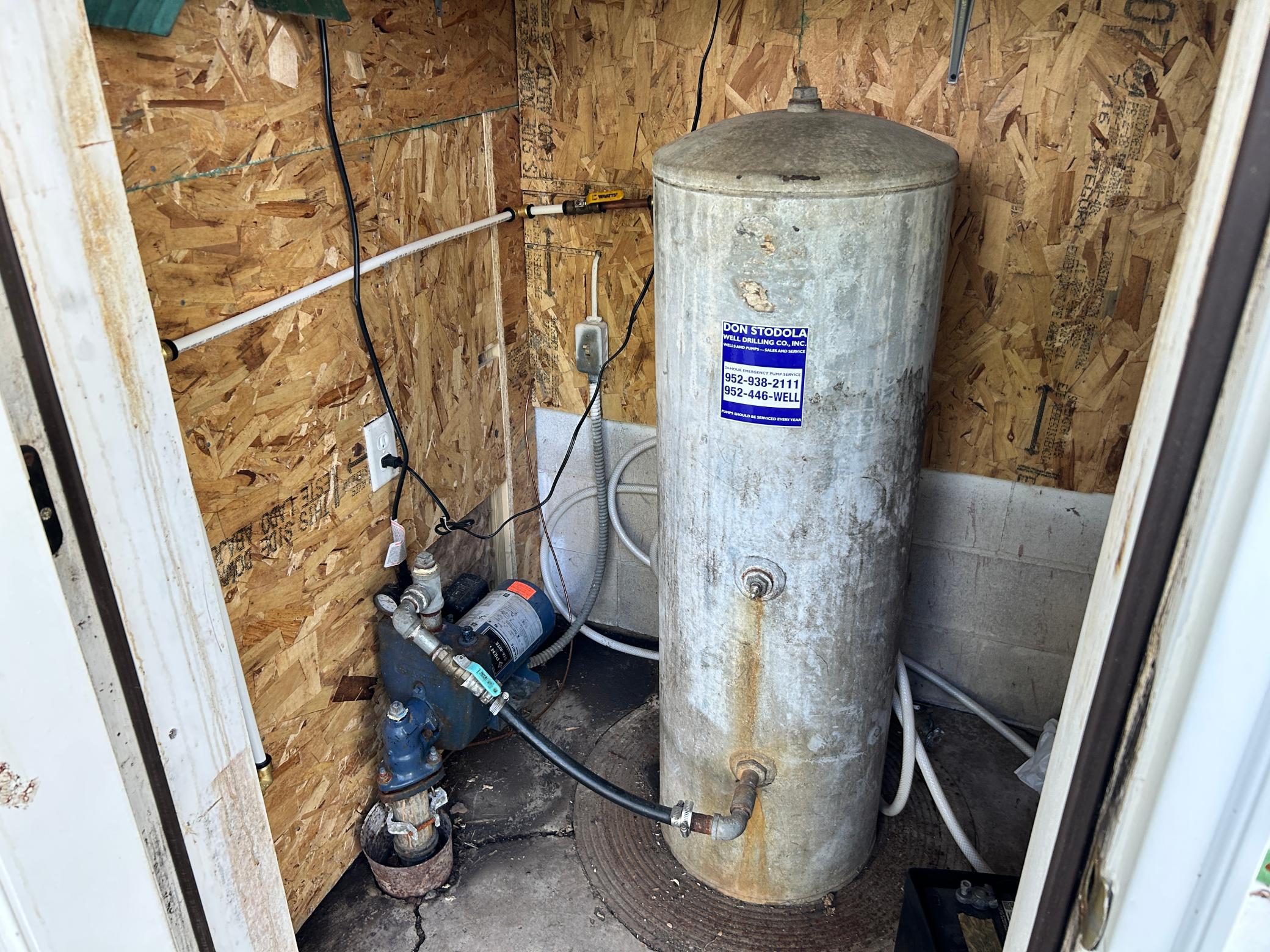 Insulated and heated well pump room.