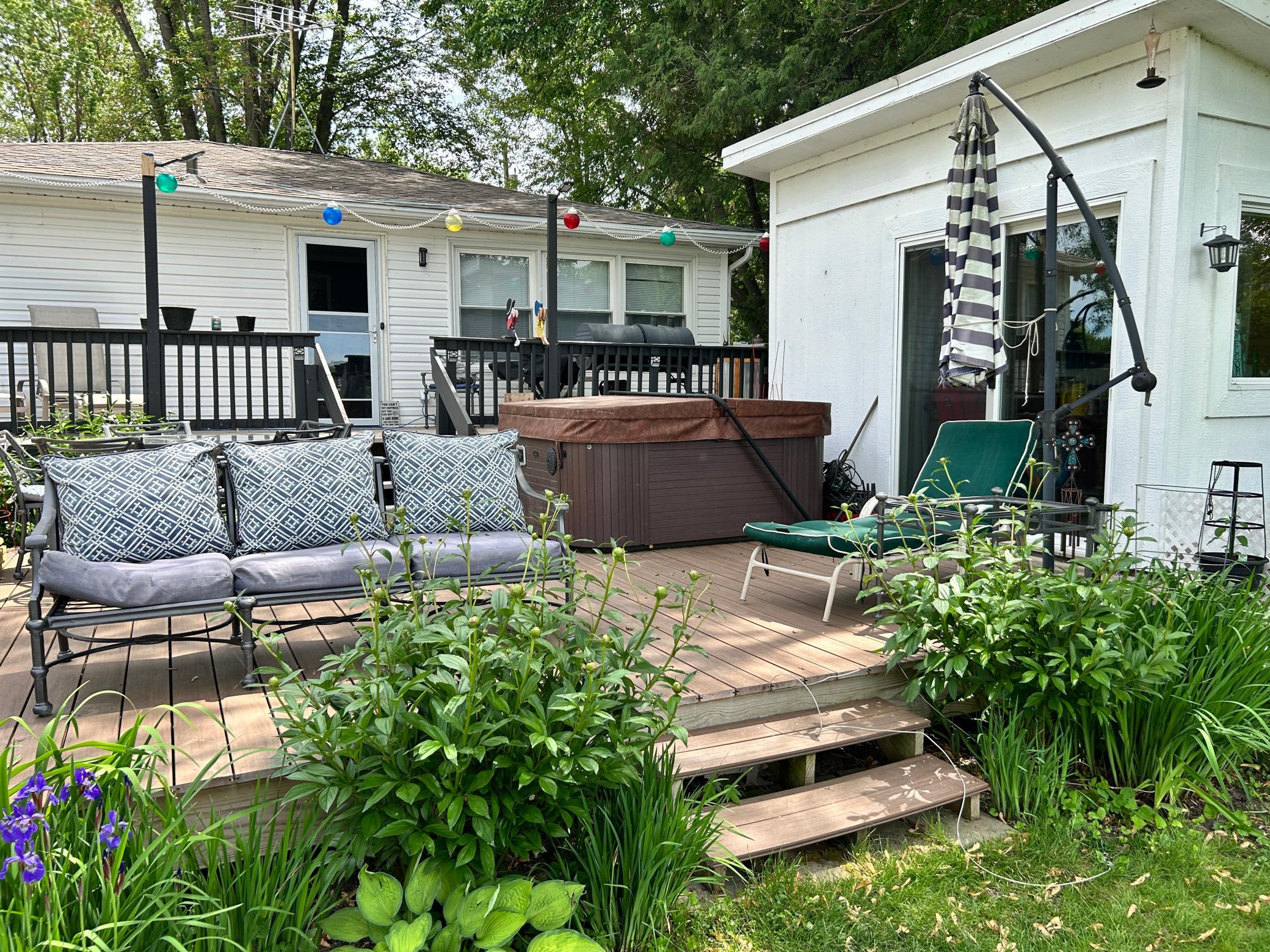 The Lakeside of the home features this great deck for entertaining. It also has a nice accessory building you can turn into what your imagination can come up with.