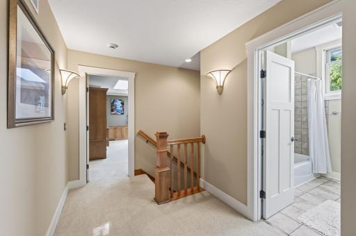 The upper level is thoughtfully designed with three well-appointed bedrooms, creating a peaceful retreat for every member of the household.