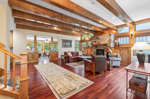 Soaring ceilings, exposed beams, and handcrafted millwork create a space that is both grand and welcoming.