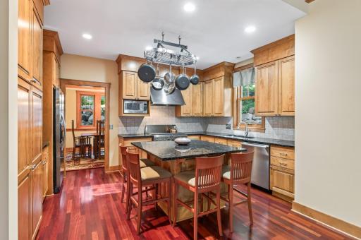 Anchored by a curated collection of Wolf, Sub-Zero, and Bosch appliances, this kitchen is designed to perform as beautifully as it looks.