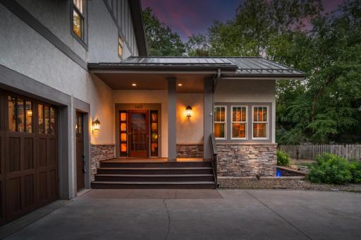 An inviting front porch sets the tone for what lies beyond.