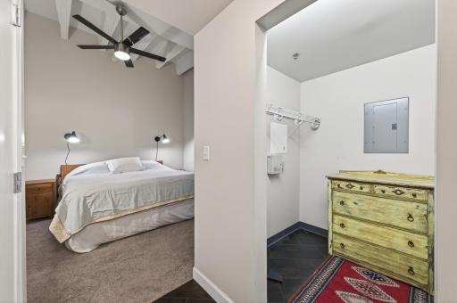 Entering the main bedroom from the bath with views of the walk in closet.