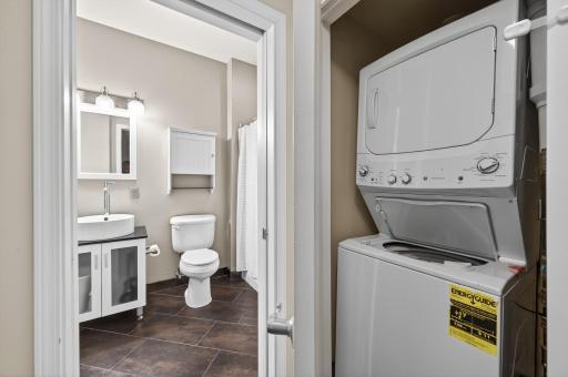 In unit laundry on the opposite side of the walk in closet.