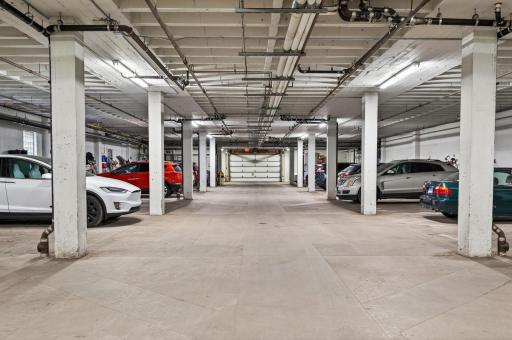 Views of clean, well lit, and secured garage.
