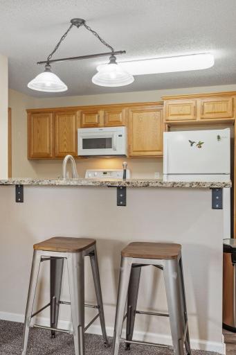 Kitchen breakfast bar was added during the updating and it a great place to enjoy your morning coffee
