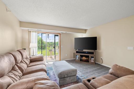 Living room with access to the covered balcony and beautiful views