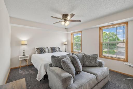 Large primary bedroom with large 3/4 bath and a huge walk-in closet
