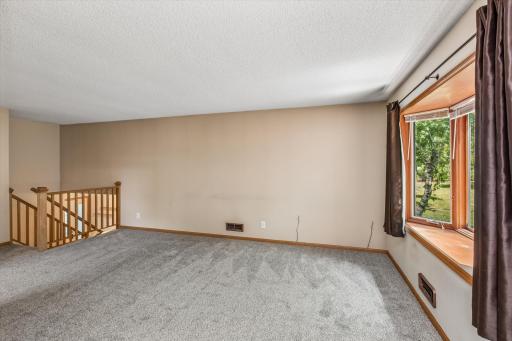 Open, comfortable space suited for multiple furniture arrangements