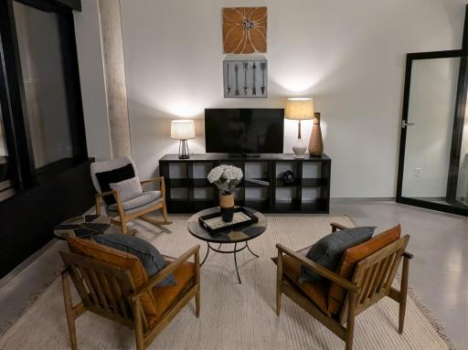 A seamless social core prioritizes an open-concept layout, combining the kitchen, dining, and living spaces to dedicate the majority of a home's square footage to communal interaction