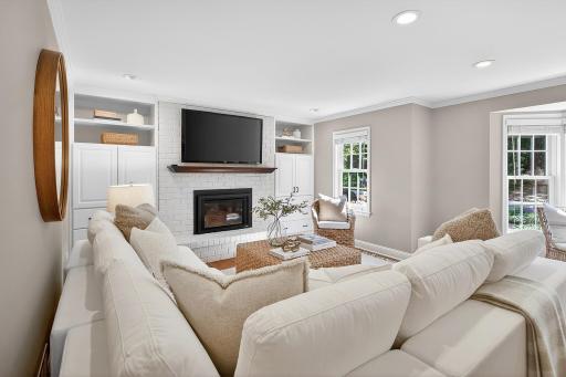 Main Floor Family Room with Gas Fireplace and Bay Window