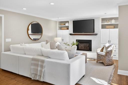 Main Floor Family Room - Recessed Lighting, Hardwood Floors, Custom Built-Ins