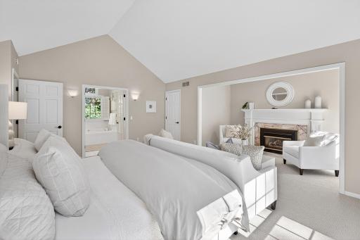 Primary Suite - Vaulted Ceilings and Sitting Room with Gas Fireplace