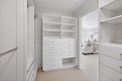 Primary Suite Walk In Closet with Built-Ins