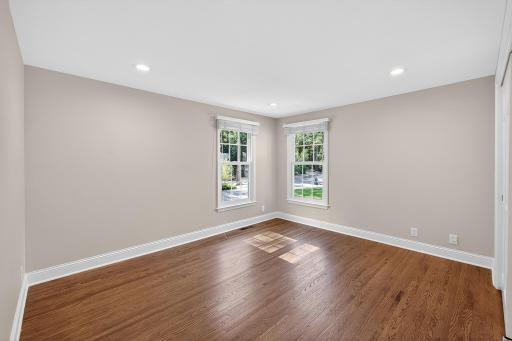 Fourth Upper Level Bedroom with Hardwood Floors and Nice Closet Space