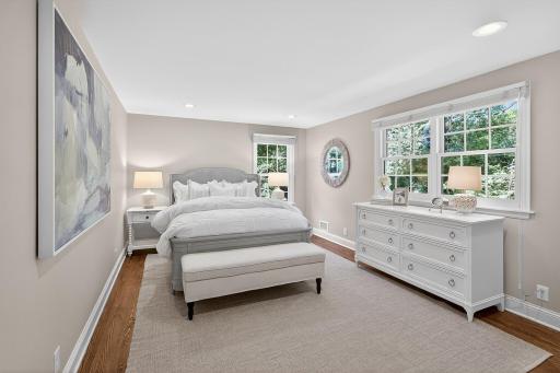 Second Bedroom On Upper Floor with Hardwood Floors and Generous Closet