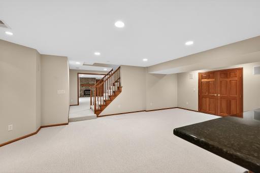 Lower Level - New Carpet May 2026 - Center Stairwell - Two Gathering Areas