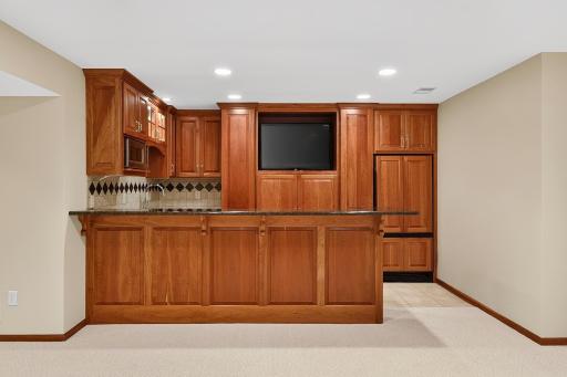 Wet Bar with Room for Four Barstools / Built In Refrigerator