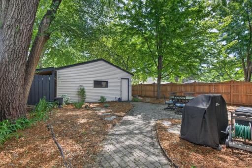 2 car garage with vinyl siding and newer roof.