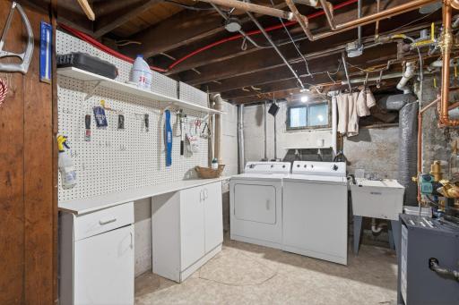 Lower level laundry, shop and utility room.