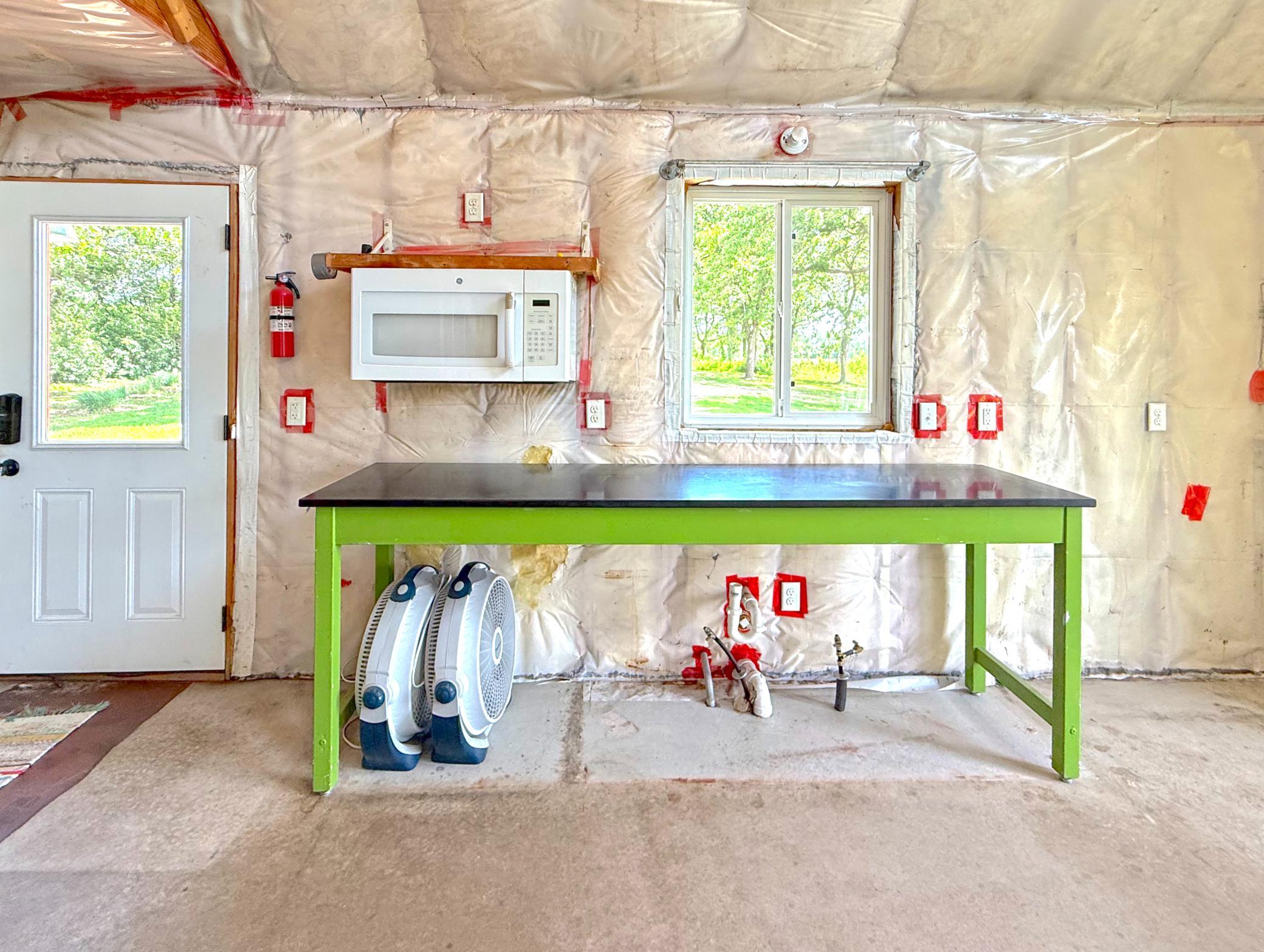 The bunkhouse is already equipped with electrical service and roughed-in plumbing, providing an excellent head start for completion.