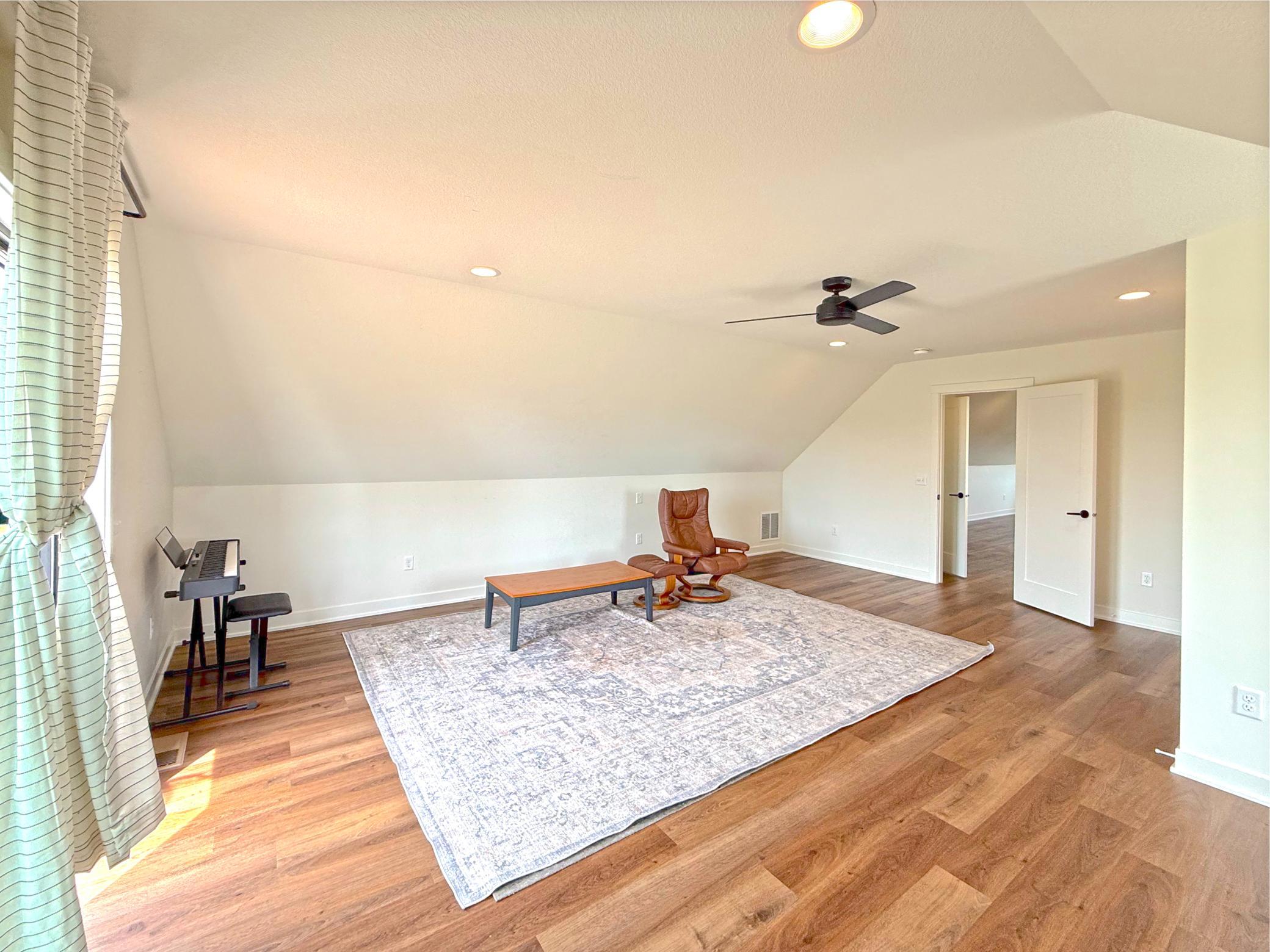 Whether used as a media room, game room, or additional gathering space, this expansive area offers endless possibilities for hosting gatherings.