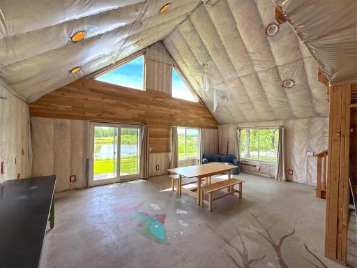 The bunkhouse is completely insulated offering a furnace, spacious loft and full bathroom, just awaiting your final touches.