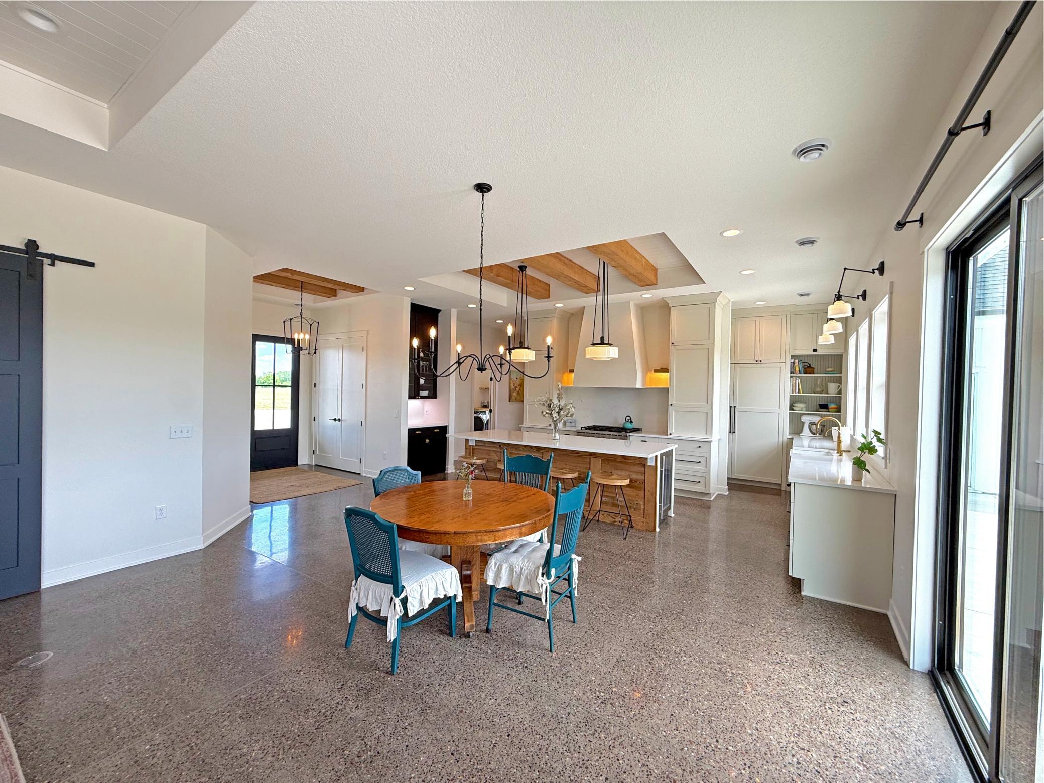 Thoughtfully designed for both everyday living and entertaining, this inviting gathering space blends timeless craftsmanship with modern comfort.