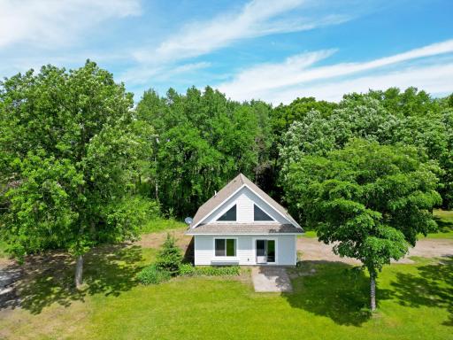 The established Oak trees provide shade, beauty, and a sense of seclusion, creating the perfect backdrop.
