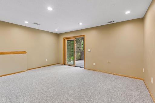 Sliding glass door to backyard has built in blinds!