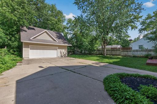 Concrete driveway to have room to park, play, work