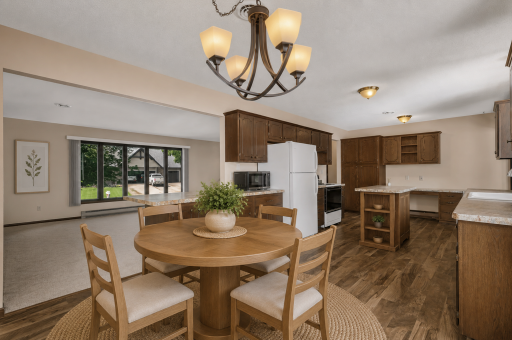 Plenty of room for seating around a dining table, the kitchen penincula or even at the mobile kitchen island. Virtaully staged