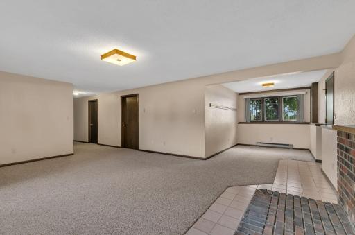 Another view of the lower level family room and mudroom space. Views of the lake