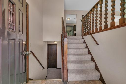 Making our way downstair to 2 additional bedrooms, lake level laundry room, family room and great mudroom space