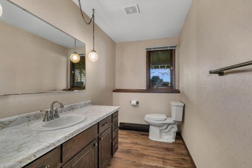 Lower level 3/4 bath has lake view and had new flooring added in 2024