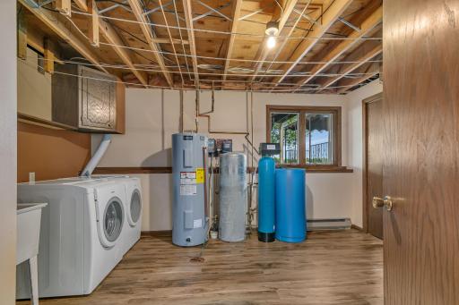 Lower level laundry with lots of storage. New flooring in 2024