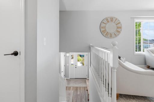 Front Foyer with closet and access to 3-stall garage.