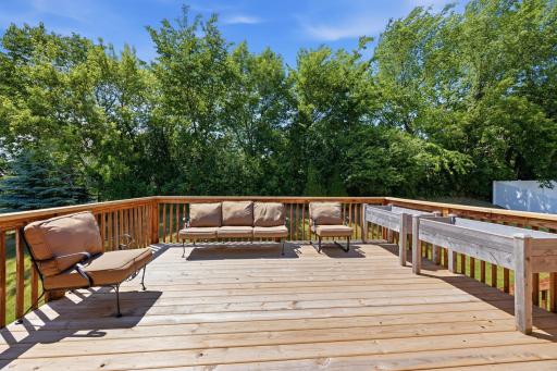 Generously sized deck with a private natural buffer