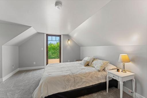 Bedroom 2 with door to upper private deck