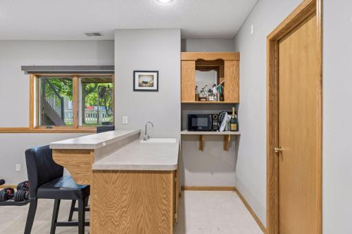 The lower-level is a perfect hang out space for kids and adults. Play games, watch movies, watch the big game, etc. and grab your snacks and beverages from the wet bar!